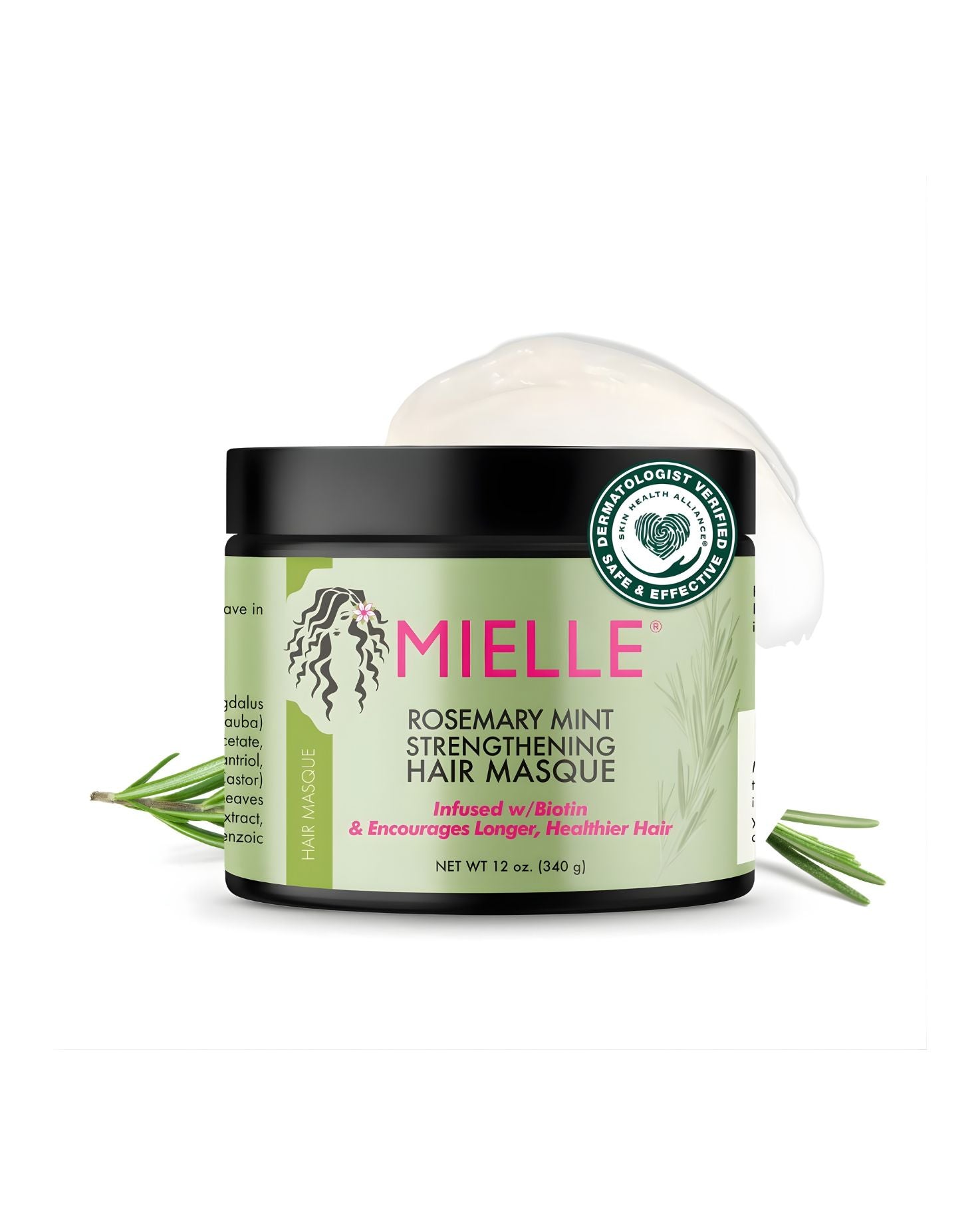 The Mielle Rosemary Mint Strengthening Hair Masque jar, featuring a black lid and a green label with rosemary illustrations. A dollop of white masque product is visible on top, and sprigs of fresh rosemary frame the jar. The label indicates it is 'Infused w/ Biotin & Encourages Longer, Healthier Hair' and is 'DERMATOLOGIST VERIFIED,' isolated against a white background.