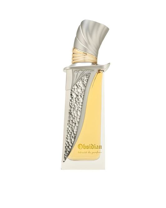 French avenue Obsidian Extrait de Parfum in a luxury silver and gold bottle shaped like a traditional dagger with hammered metal detailing.