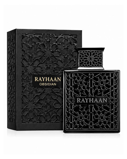 Rayhaan Obsidian Eau de Parfum black geometric latticed bottle displayed next to its matching textured black packaging box.