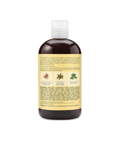 Close-up of Shea Moisture shampoo label showing the full ingredient list, usage instructions, and illustrations for Jamaican Black Castor Oil, Fair Trade Shea Butter, and Peppermint.