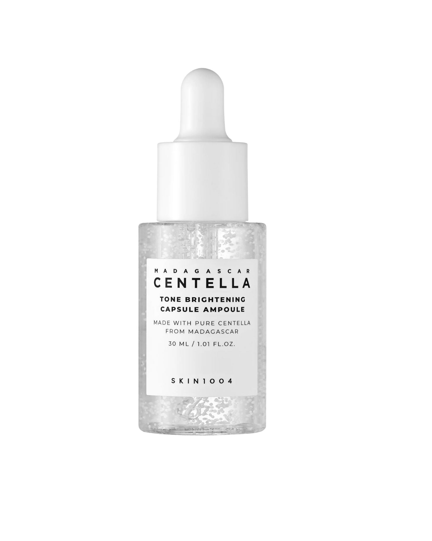 Clear glass dropper bottle of SKIN 1004 Madagascar Centella Tone Brightening Capsule Ampoule. The label indicates the size is 30 mL / 1.01 fl. oz.