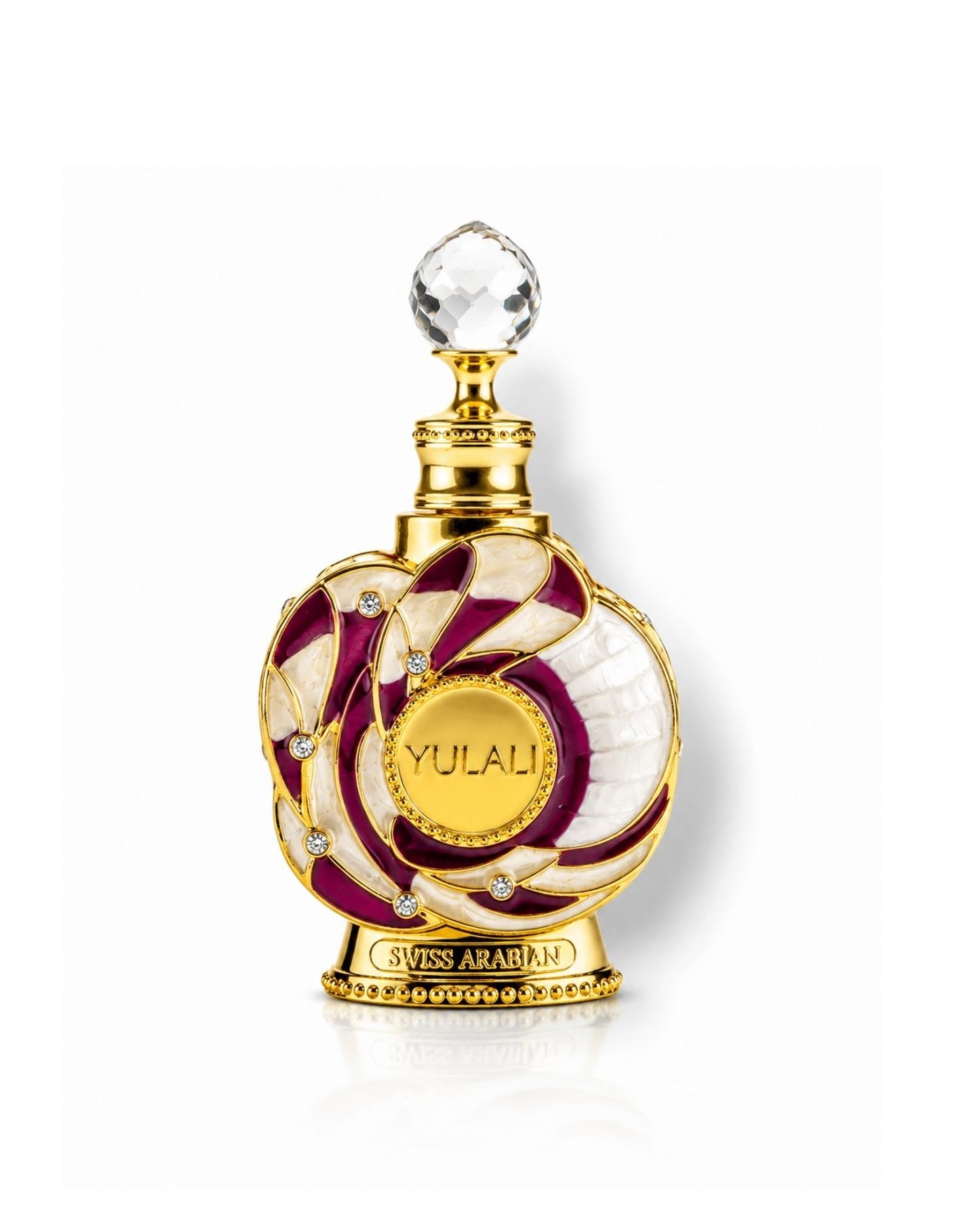 Swiss Arabian Yulali concentrated perfume oil in an ornate gold, purple, and white patterned bottle topped with a crystal stopper.